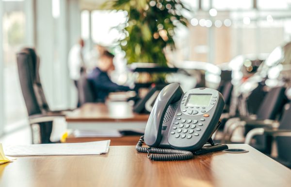 A black telephone in the office